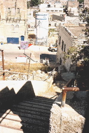 Main access steps to Qurtuba School, now blocked with razor wire